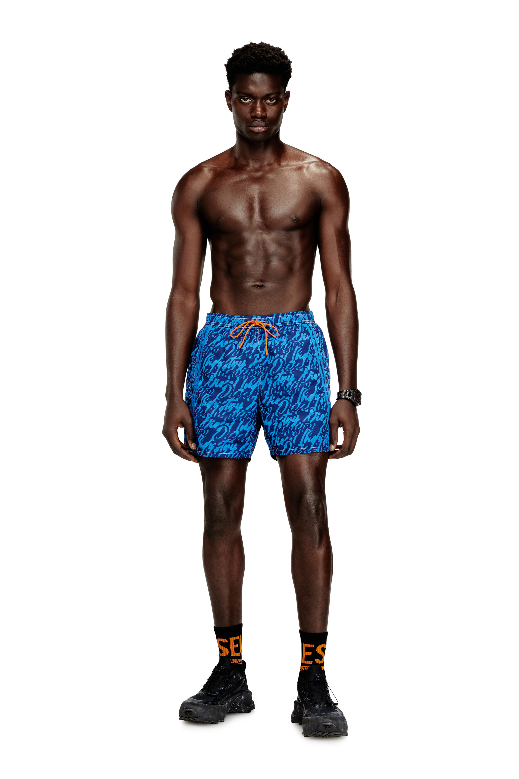 Diesel - SOCCER-41-D-POP, Man's Swim shorts with all-over logo print in Blue - 1